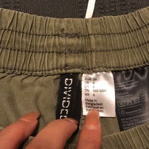 American Eagle Outfitters Shorts - White crop top with arm green soft shorts. American Eagle Outfitters Shorts - White crop top with arm green soft shorts.
